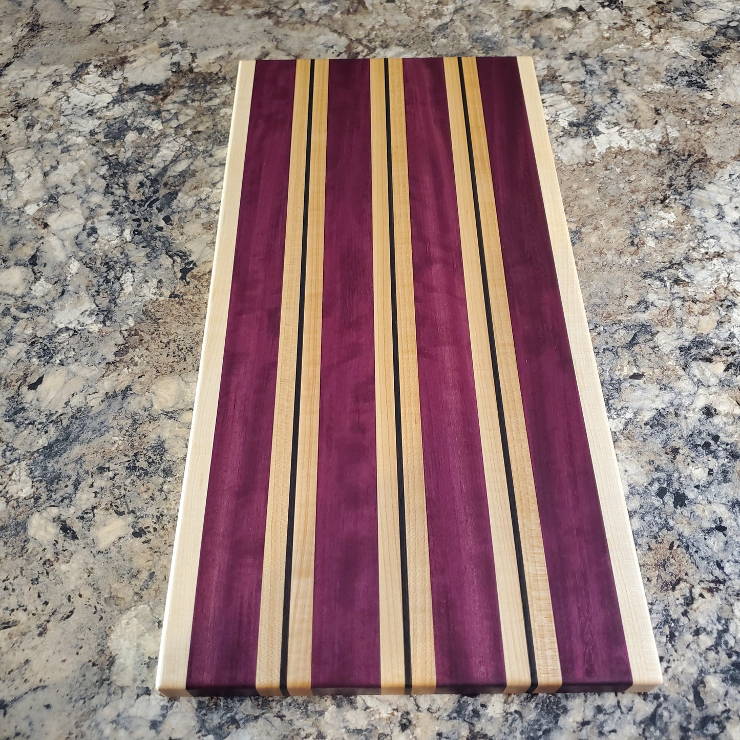 Signature Series Semper Fi cutting board made from maple, purple heart, and wenge by Lone Wolf Wood Designs