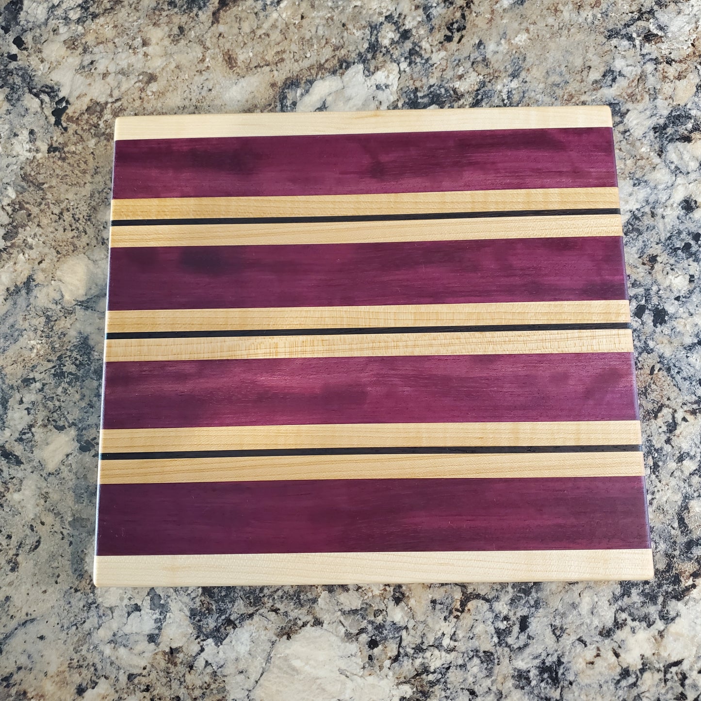 Signature Series Semper Fi cutting board made from maple, purple heart, and wenge by Lone Wolf Wood Designs