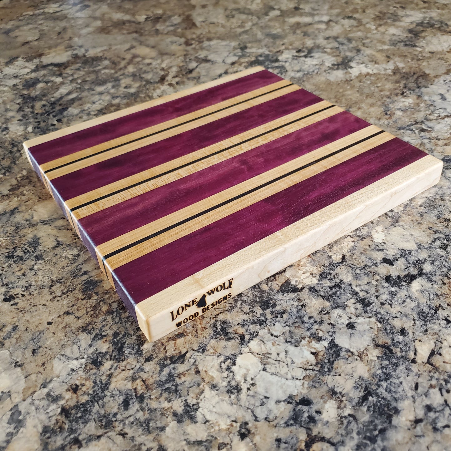 Signature Series Semper Fi cutting board made from maple, purple heart, and wenge by Lone Wolf Wood Designs