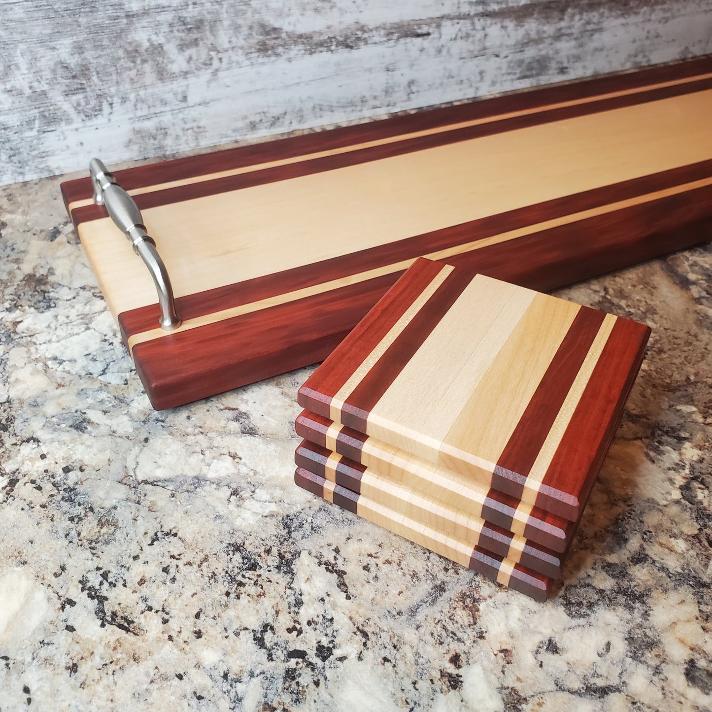 Premium handmade Winter Bliss Serving Tray made with maple and red heart, shown with coordinating coasters, both by Lone Wolf Wood Designs