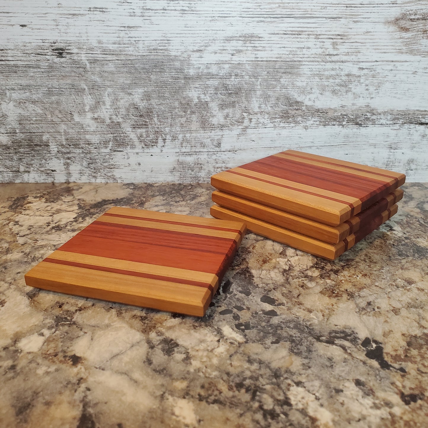 Premium handmade Autumn Glow coasters made from cherry and padauk by Lone Wolf Wood Designs