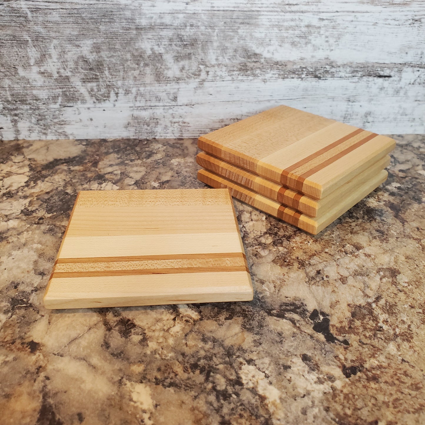 Classic coasters, made of primarily maple with two cherry stripes