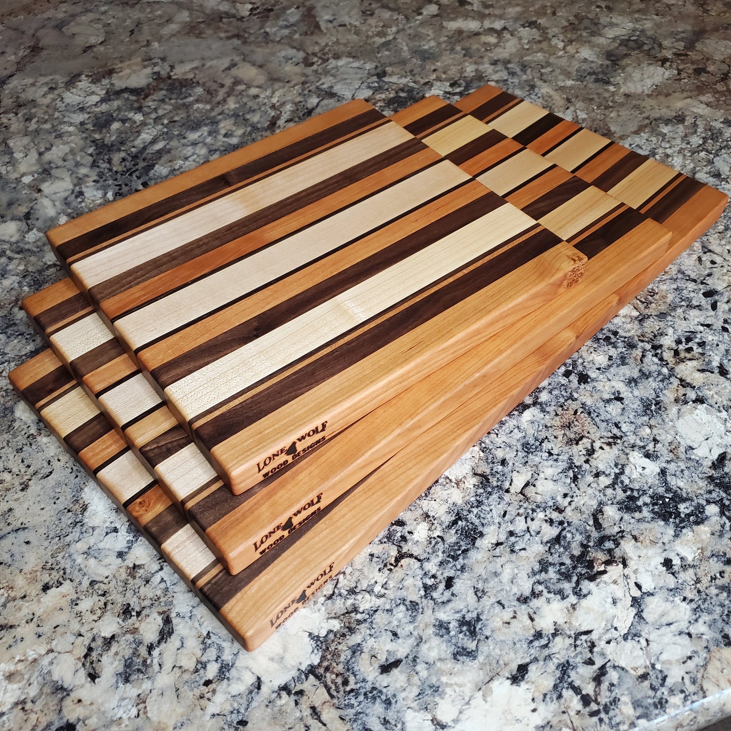 Signature Series Neutral Beauty cutting board made from maple, cherry, walnut and wenge by Lone Wolf Wood Designs