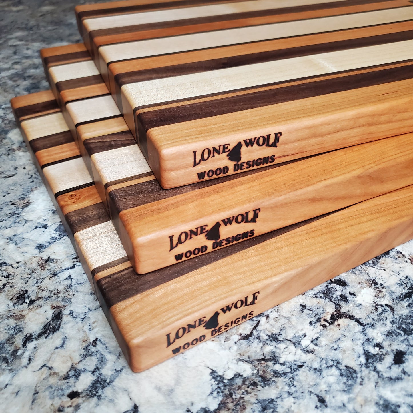 Signature Series Neutral Beauty cutting board made from maple, cherry, walnut and wenge by Lone Wolf Wood Designs