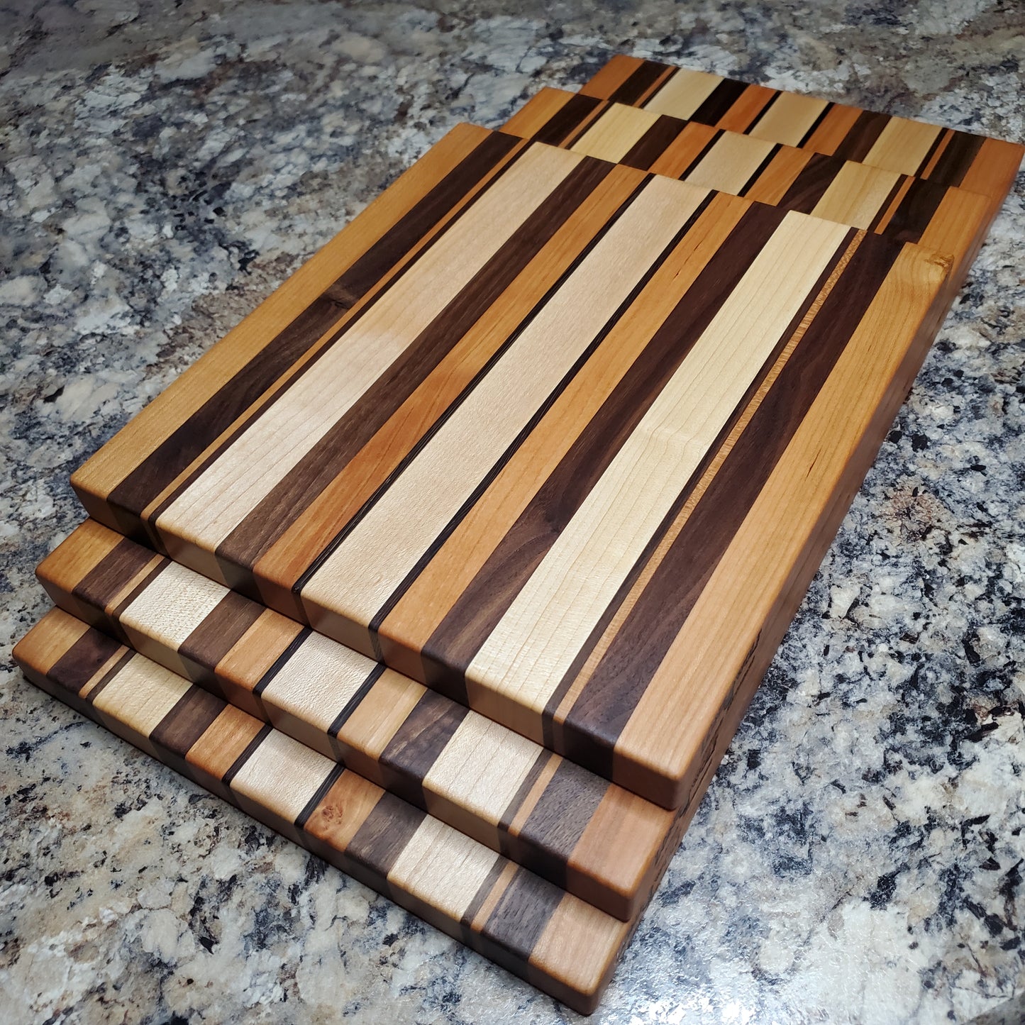 Signature Series Neutral Beauty cutting board made from maple, cherry, walnut and wenge by Lone Wolf Wood Designs